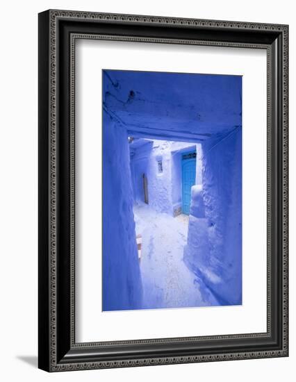 Morocco, Chaouen. Narrow Street Lined with Blue Buildings-Emily Wilson-Framed Photographic Print