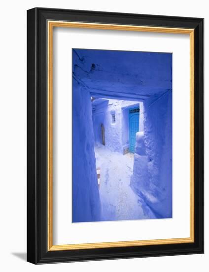 Morocco, Chaouen. Narrow Street Lined with Blue Buildings-Emily Wilson-Framed Photographic Print