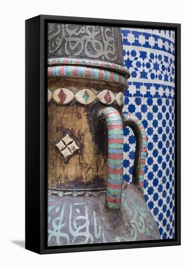 Morocco, Fes. Vase and pillar details with traditional design in the interior of a riad.-Brenda Tharp-Framed Premier Image Canvas