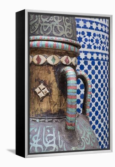 Morocco, Fes. Vase and pillar details with traditional design in the interior of a riad.-Brenda Tharp-Framed Premier Image Canvas