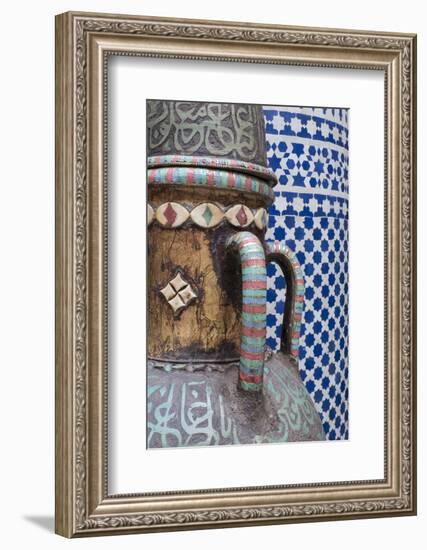 Morocco, Fes. Vase and pillar details with traditional design in the interior of a riad.-Brenda Tharp-Framed Photographic Print