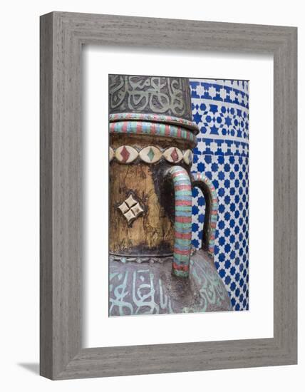 Morocco, Fes. Vase and pillar details with traditional design in the interior of a riad.-Brenda Tharp-Framed Photographic Print
