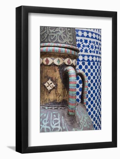 Morocco, Fes. Vase and pillar details with traditional design in the interior of a riad.-Brenda Tharp-Framed Photographic Print