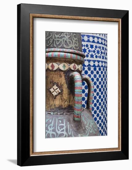 Morocco, Fes. Vase and pillar details with traditional design in the interior of a riad.-Brenda Tharp-Framed Photographic Print