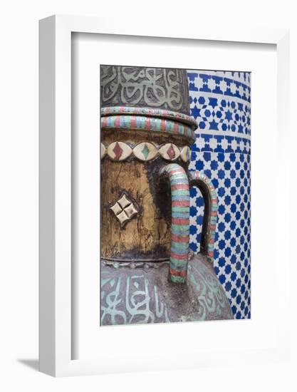 Morocco, Fes. Vase and pillar details with traditional design in the interior of a riad.-Brenda Tharp-Framed Photographic Print