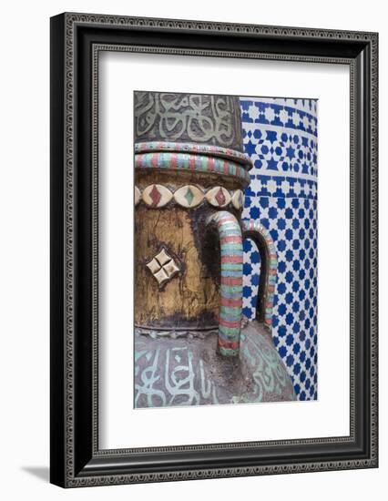 Morocco, Fes. Vase and pillar details with traditional design in the interior of a riad.-Brenda Tharp-Framed Photographic Print