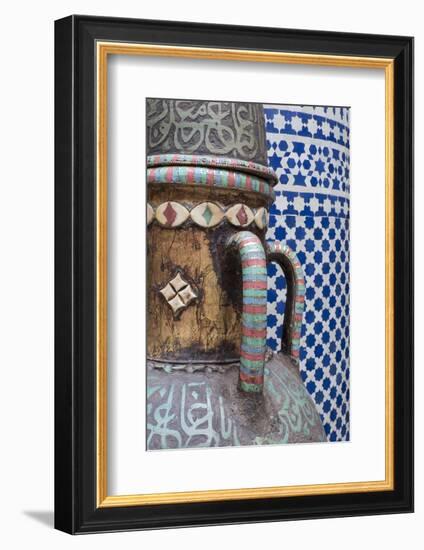 Morocco, Fes. Vase and pillar details with traditional design in the interior of a riad.-Brenda Tharp-Framed Photographic Print