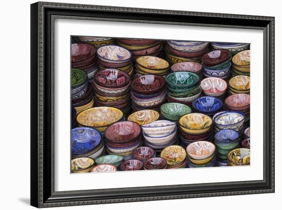 Morocco, Marrakech. Colorfully painted ceramic bowls for sale in a souk, a shop.-Brenda Tharp-Framed Photographic Print