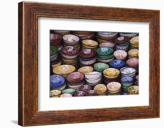 Morocco, Marrakech. Colorfully painted ceramic bowls for sale in a souk, a shop.-Brenda Tharp-Framed Photographic Print