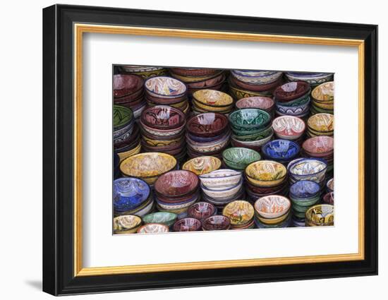 Morocco, Marrakech. Colorfully painted ceramic bowls for sale in a souk, a shop.-Brenda Tharp-Framed Photographic Print