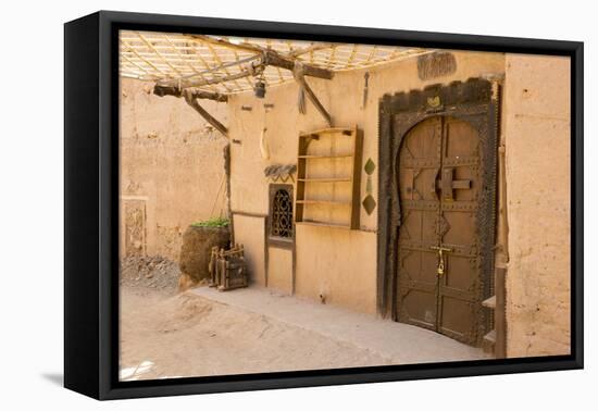 Morocco, South of Morocco, Traditionally Carved Wood Door at Tamnougalt Kasbah in the Draa Valley-Emily Wilson-Framed Premier Image Canvas