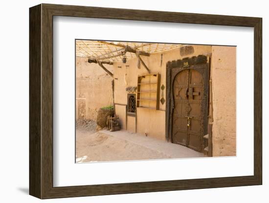 Morocco, South of Morocco, Traditionally Carved Wood Door at Tamnougalt Kasbah in the Draa Valley-Emily Wilson-Framed Photographic Print