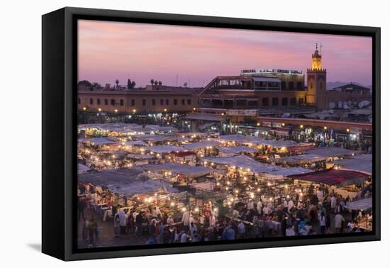 Morocco. Sunset over the famous Djemaa El-Fna square in Marrakech-Brenda Tharp-Framed Premier Image Canvas