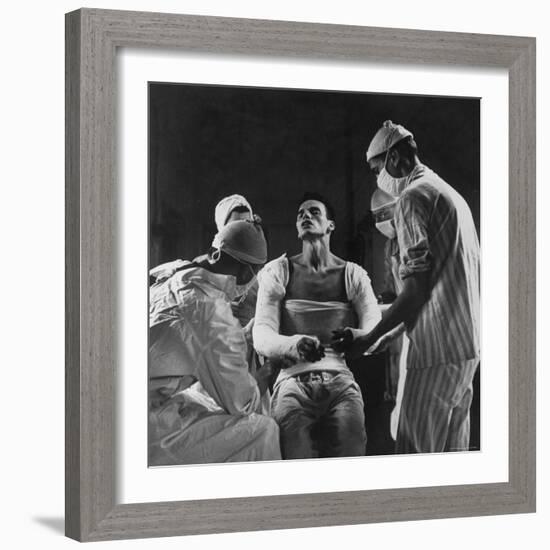 Mortar Wounded Army Medic Private George Lott, Sitting Up While 4 Army Surgeons Finish Up His Cast-Ralph Morse-Framed Photographic Print