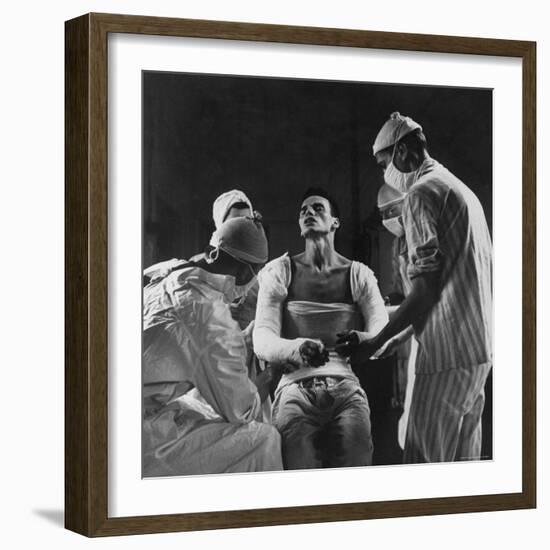 Mortar Wounded Army Medic Private George Lott, Sitting Up While 4 Army Surgeons Finish Up His Cast-Ralph Morse-Framed Photographic Print