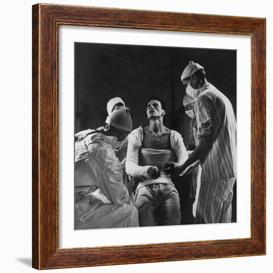 Mortar Wounded Army Medic Private George Lott, Sitting Up While 4 Army Surgeons Finish Up His Cast-Ralph Morse-Framed Photographic Print