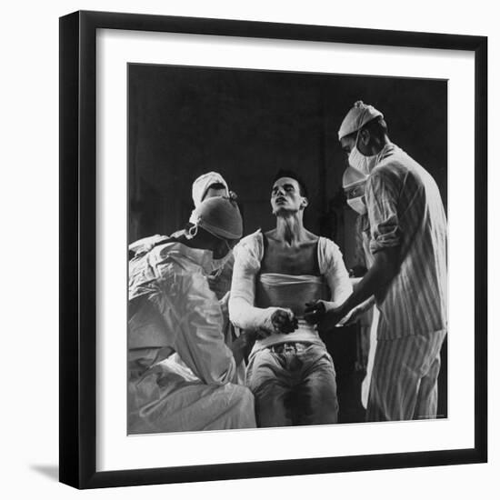 Mortar Wounded Army Medic Private George Lott, Sitting Up While 4 Army Surgeons Finish Up His Cast-Ralph Morse-Framed Photographic Print