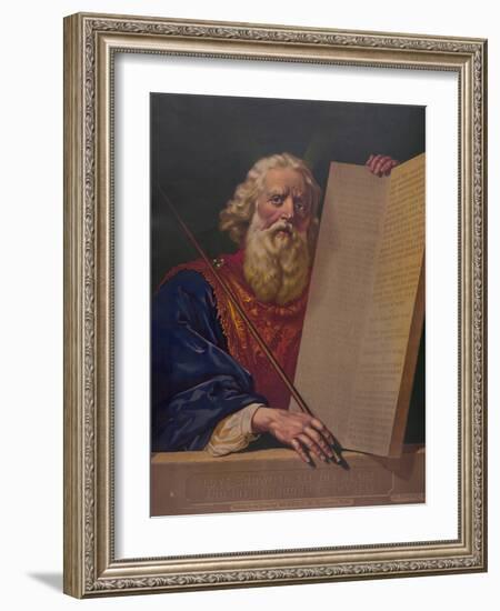 Moses holding the tablets inscribed with the Ten Commandments.-Stocktrek Images-Framed Art Print