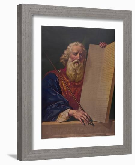 Moses holding the tablets inscribed with the Ten Commandments.-Stocktrek Images-Framed Art Print