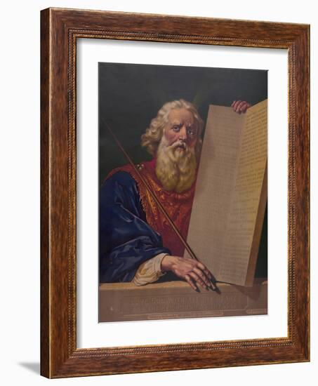 Moses holding the tablets inscribed with the Ten Commandments.-Stocktrek Images-Framed Art Print