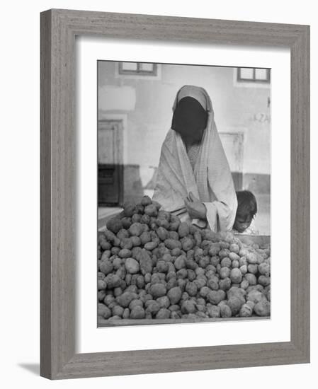 Moslem Woman Shopping for Potatoes-John Phillips-Framed Photographic Print