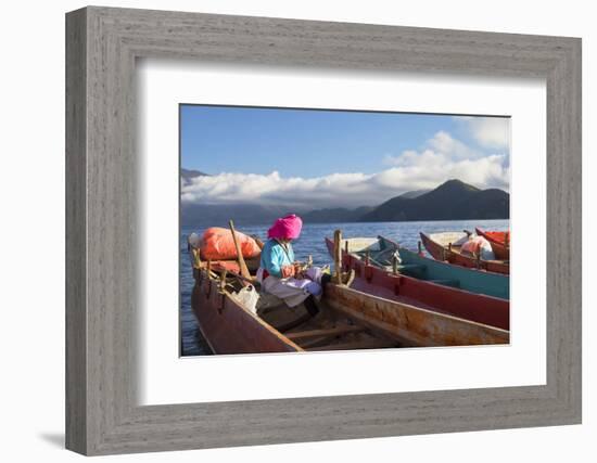 Mosu woman on boat, Luoshui, Lugu Lake, Yunnan, China, Asia-Ian Trower-Framed Photographic Print