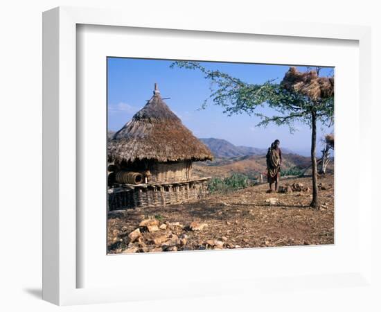 Mother and Child Walk Through a Konso Village, Omo River Region, Ethiopia-Janis Miglavs-Framed Photographic Print