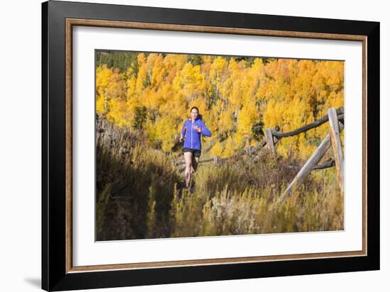 Mother And Daughter Trail Running In The Fall In Colorado-Liam Doran-Framed Photographic Print