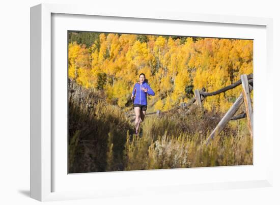 Mother And Daughter Trail Running In The Fall In Colorado-Liam Doran-Framed Photographic Print