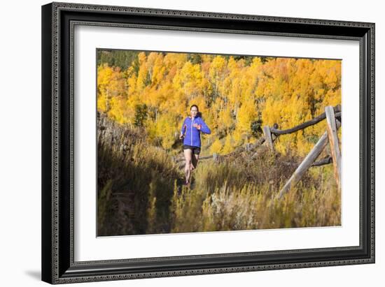 Mother And Daughter Trail Running In The Fall In Colorado-Liam Doran-Framed Photographic Print