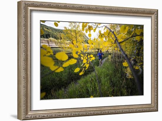 Mother And Daughter Trail Running In The Fall In Colorado-Liam Doran-Framed Photographic Print