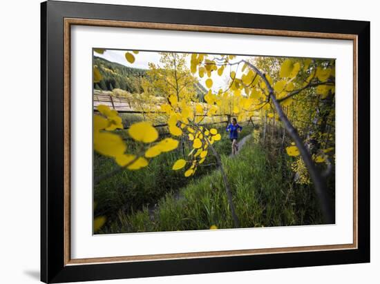 Mother And Daughter Trail Running In The Fall In Colorado-Liam Doran-Framed Photographic Print