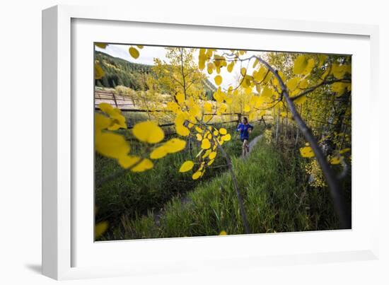 Mother And Daughter Trail Running In The Fall In Colorado-Liam Doran-Framed Photographic Print