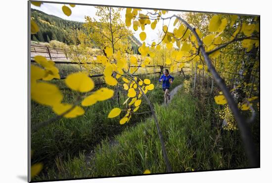 Mother And Daughter Trail Running In The Fall In Colorado-Liam Doran-Mounted Photographic Print