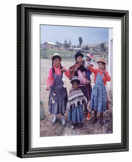 Mother and Four Children Wearing Derby Hats, Playing with Ball of Yarn, Andean Highlands of Bolivia-Bill Ray-Framed Photographic Print