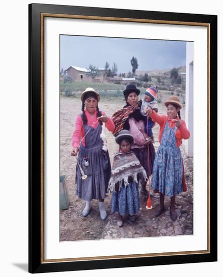 Mother and Four Children Wearing Derby Hats, Playing with Ball of Yarn, Andean Highlands of Bolivia-Bill Ray-Framed Photographic Print