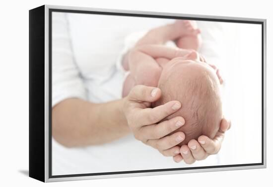 Mother And Newborn Baby Boy-Ruth Jenkinson-Framed Premier Image Canvas