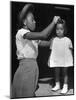 Mother Grooming Her Daughter For Healthiest Baby Contest Held at All African American Fair-Alfred Eisenstaedt-Mounted Photographic Print