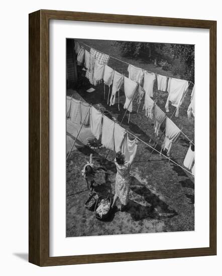 Mother Hanging Laundry Outdoors During Washday-Alfred Eisenstaedt-Framed Photographic Print
