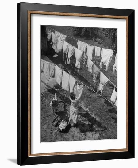 Mother Hanging Laundry Outdoors During Washday-Alfred Eisenstaedt-Framed Photographic Print