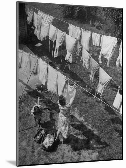 Mother Hanging Laundry Outdoors During Washday-Alfred Eisenstaedt-Mounted Photographic Print