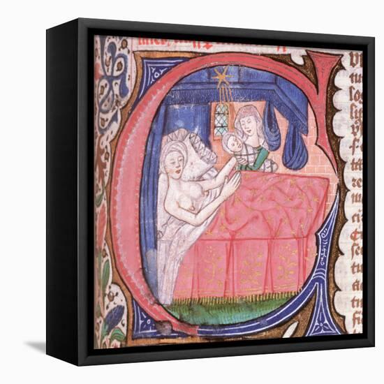 Mother receiving her newly born baby in bed, from Liber introductorium ad iudicia stellarum-Italian-Framed Premier Image Canvas