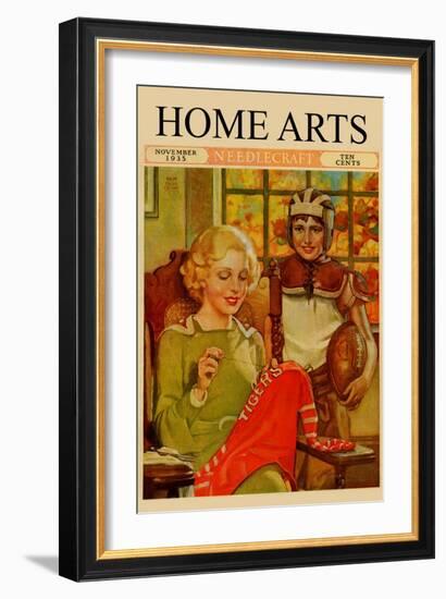 Mother Sews Her Son's Football Jersey as He Looks On-Home Arts-Framed Art Print