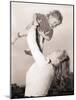 Mother Swinging Daughter up in the Air-Philip Gendreau-Mounted Photographic Print