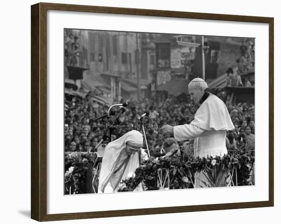 Mother Teresa Ascends the Podium to Stand Side by Side with Pope John Paul II-null-Framed Photographic Print