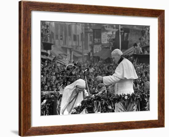 Mother Teresa Ascends the Podium to Stand Side by Side with Pope John Paul II-null-Framed Photographic Print