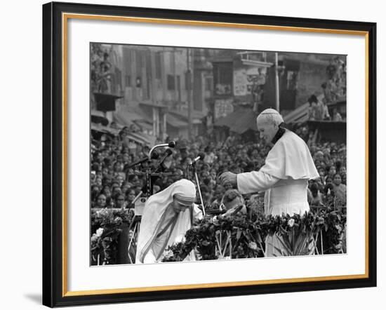 Mother Teresa Ascends the Podium to Stand Side by Side with Pope John Paul II-null-Framed Photographic Print