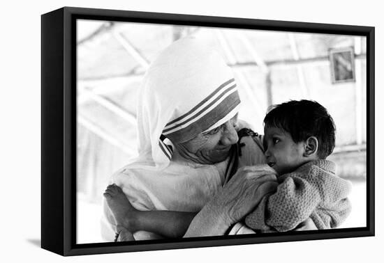 Mother Teresa with a Child-null-Framed Premier Image Canvas