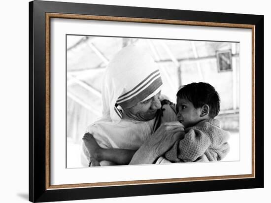 Mother Teresa with a Child-null-Framed Photographic Print