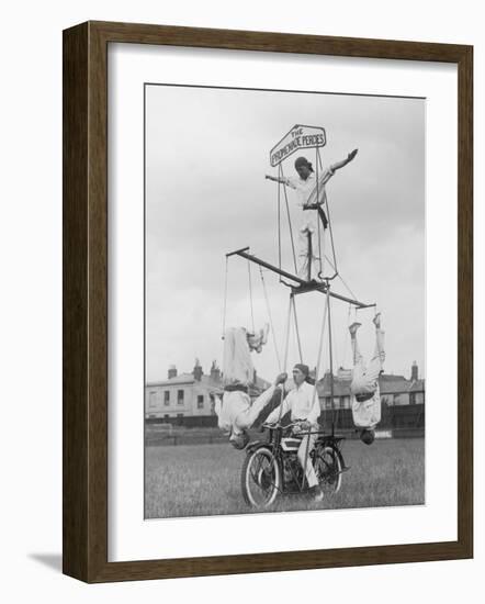 Motorcycle Acrobat Troupe Called "The Promenade Percies" Practise Their Act Involving Balance-null-Framed Photographic Print